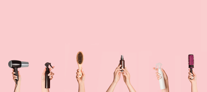 Hair_Care_Products_Over_Pink_Background