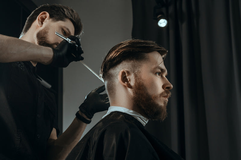 Barber_Giving_Male_Client_Haircut